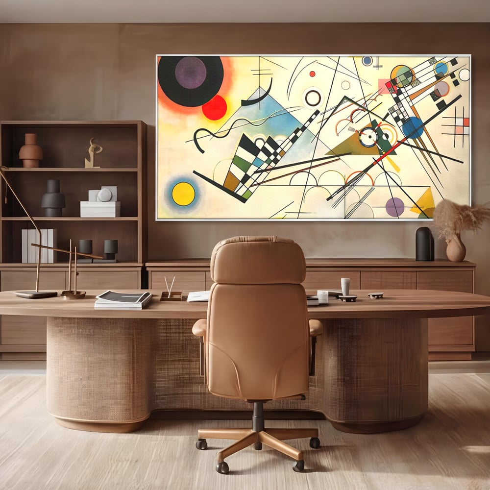 Tablou canvas cu pictura abstracta cu forme geometrice colorate, in rama de aluminiu argintiu, pe perete intr-un birou